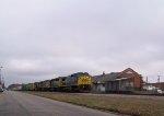 CSX 7391 leads a southbound train past the old station